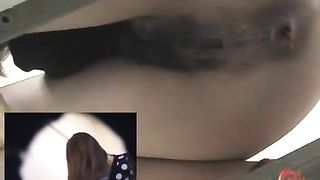 Amateur brown haired Japanese using a public bathroom