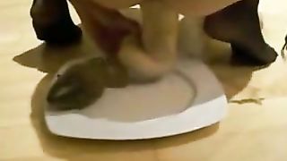 Blonde teen eating poop from her long dildo