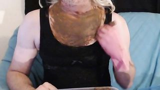 Shemale smearing shit on her entire cock