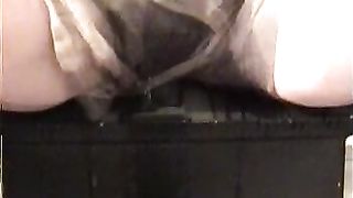 Shit and piss into her grey shorts