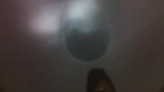 Long brown turd over the toilet