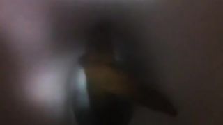 Long brown turd over the toilet