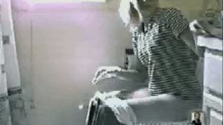Vintage video of a blonde woman pooping