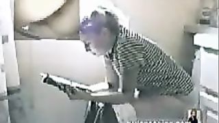 Vintage video of a blonde woman pooping