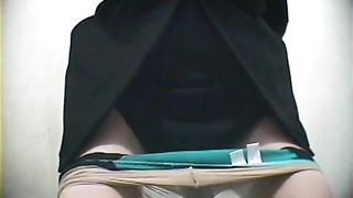 Hairy school girl using a public bathroom