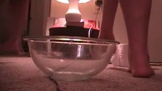 Sexy aunty shitting a lot in a plastic bowl