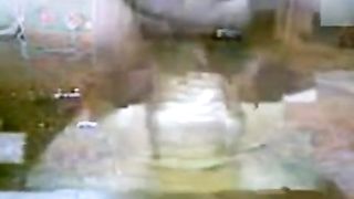 Fingering her pussy after peeing in a glass