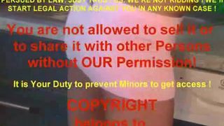 Hot hairy brunette using a public bathroom