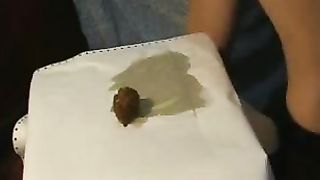Farting a tiny turd from her butthole