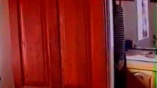 Young brunette lady shitting over the toilet