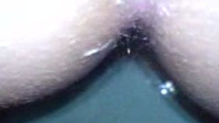 Close up of a shaved wife pooping