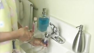 Brunette teen doing enema cause she wants to poop in her pan