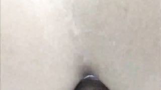 Licking whip cream from her shaved asshole