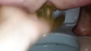 Fingering her sweet ass during bathroom time