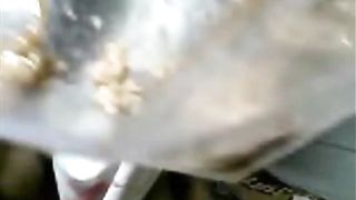 Asian lady smearing shit on her butthole