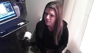 Cristal shitting in the toilet