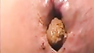 Horny Japanese undressed to poop in close up