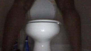 Black girl spreading her big butt cheeks to poop