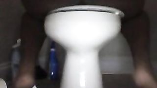 Black girl spreading her big butt cheeks to poop