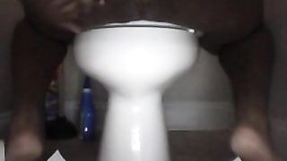 Black girl spreading her big butt cheeks to poop