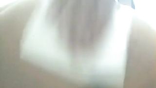 Young beauty shitting in a public bathroom