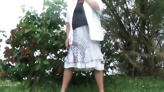 Sexy blonde granny wiping her ass outdoor