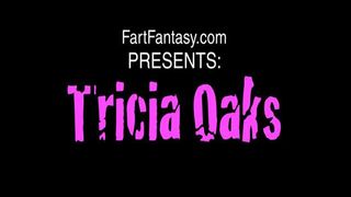 Tattooed rocker girl farting in front of a mirror