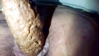 Close up of a sexy MILF that's pooping