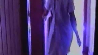 Brunette nurse pooping in a toilet