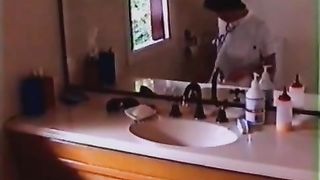 Brunette nurse pooping in a toilet
