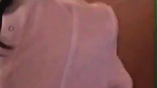 Brunette nurse pooping in a toilet