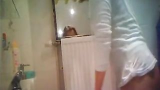 Hidden camera while step sister is pooping
