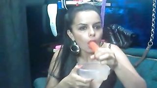 Chubby eating a mix of scat from a plastic lunch box