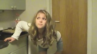 Hot blonde peeing in a metallic sink