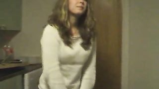 Hot blonde peeing in a metallic sink