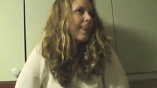 Hot blonde peeing in a metallic sink