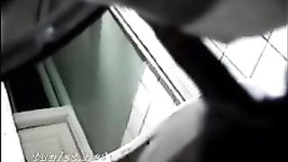 Mature blonde granny shitting in public bathroom