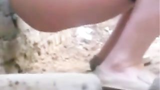 Beautiful skinny girl caught shitting outdoor