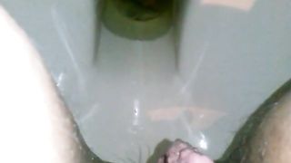 Sexy amateur wife peeing and pooping in close up