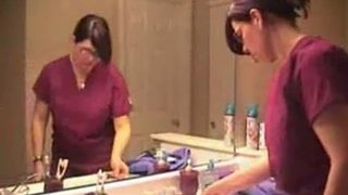 Beautiful MILF doing enema to herself