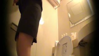 Beautiful Japanese girl shitting in public bathroom