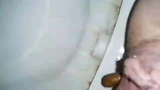 Dropped a long red turd in the toilet