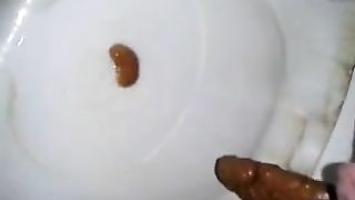 Dropped a long red turd in the toilet