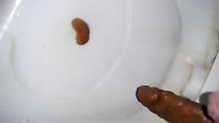 Dropped a long red turd in the toilet