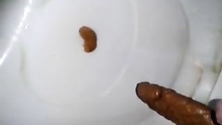 Dropped a long red turd in the toilet