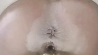 Hairy woman farting dust from her shaved ass