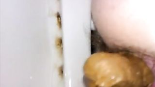 Hairy wife peeing and pooping in toilet