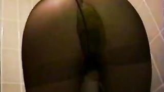 Asian teen shitting in black pantyhose