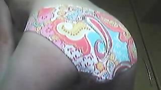 Huge turd in her colorful panties