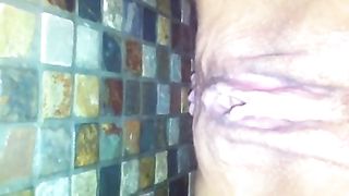 Amateur woman peeing and pooping on bathroom floor